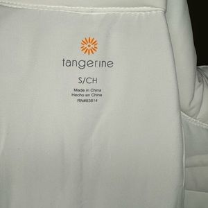 Tangerine white puffer vest.